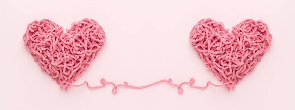 Valentine's Day Banner with Two Hearts Connected Together.